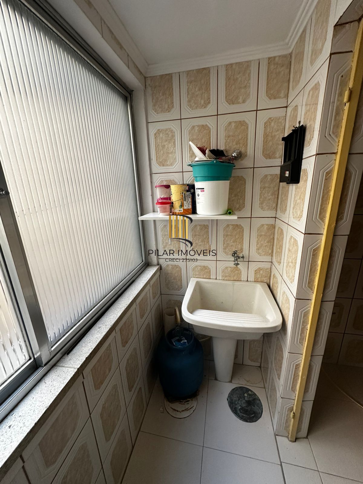 Apartamento de 2 quartos e 1 vaga de garagem no bairro Menino Deus em POA/RS