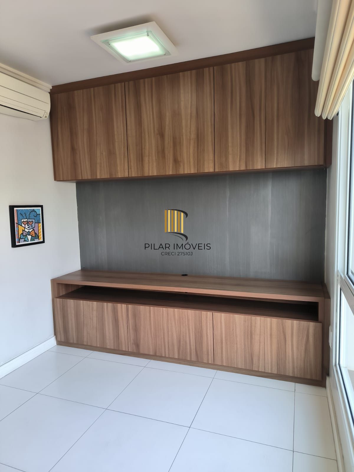 Apartamento de um quarto e uma vaga de garagem no bairro Menino Deus em POA/RS