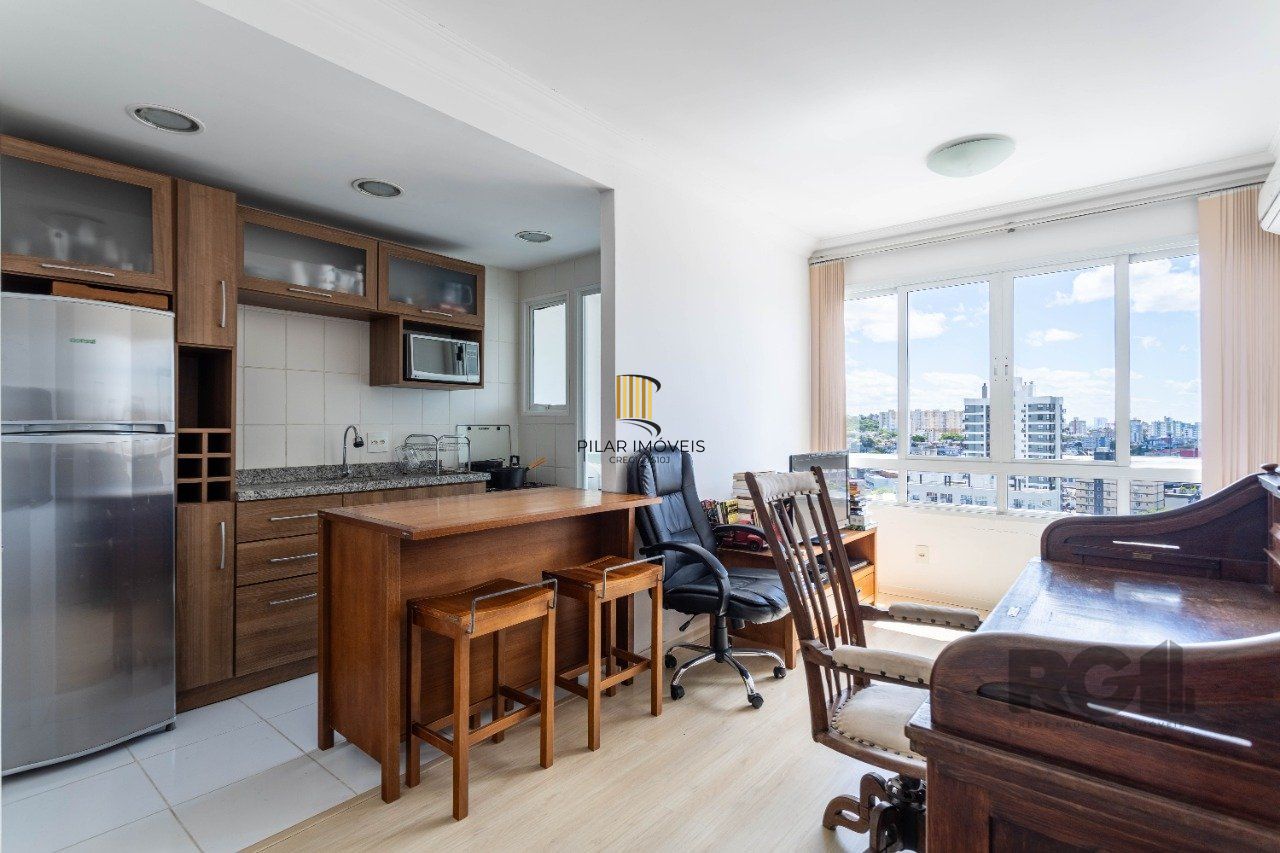   Apartamento de um quarto (dormitório) e uma vaga de garagem no bairro Jardim Botânico em Porto Alegre. 