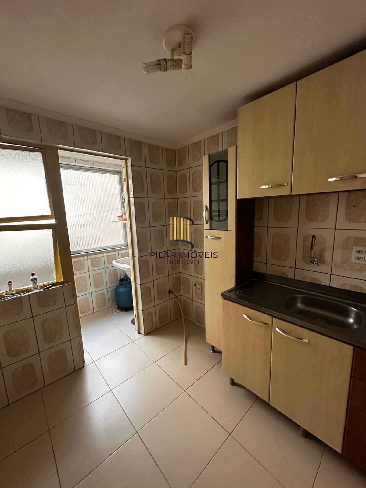 Apartamento de 2 quartos e 1 vaga de garagem no bairro Menino Deus em POA/RS