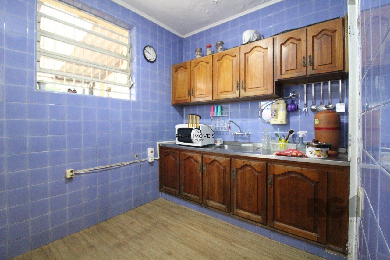 Casa à venda 4 quartos (dormitórios), suíte, 3 vagas - Partenon, Porto Alegre