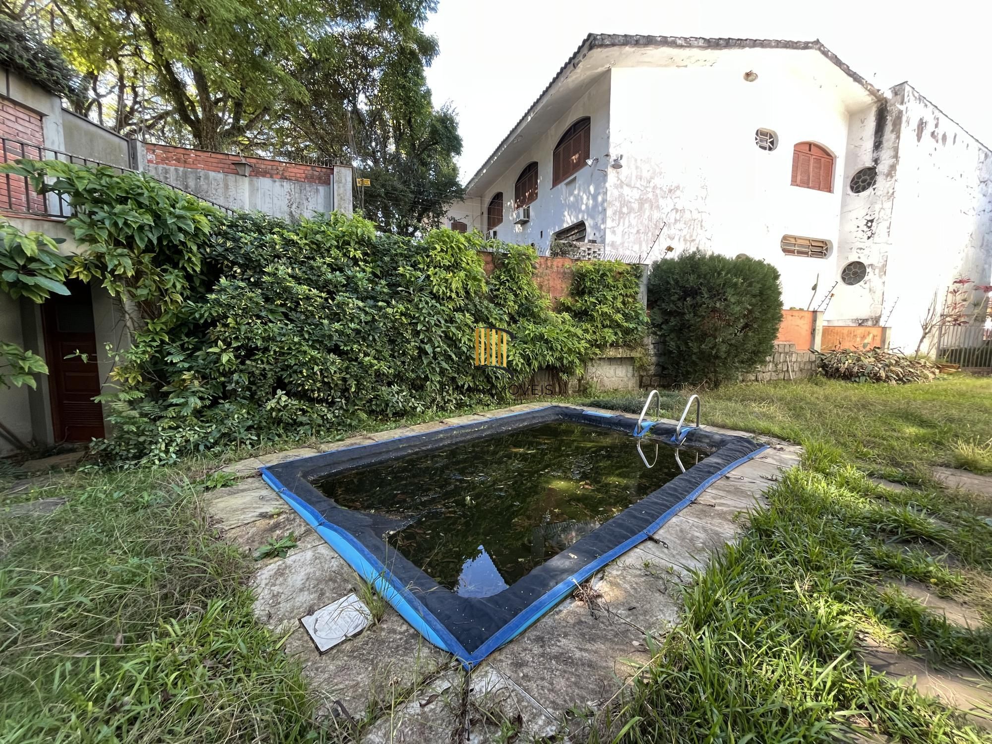 Casa de 4 quartos, 2 suítes e 2 vagas de garagem no bairro Boa Vista em POA