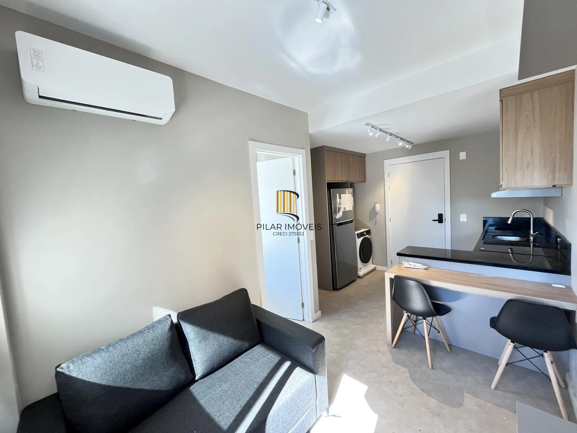Apartamento semi mobiliado de um quarto com infra e garagem
