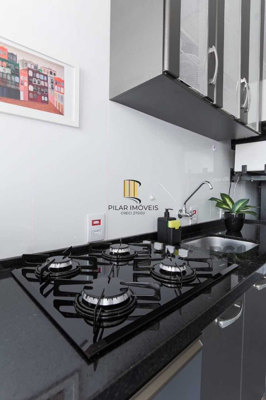 Apartamento de dois quartos no bairro Farroupilha em Porto Alegre.