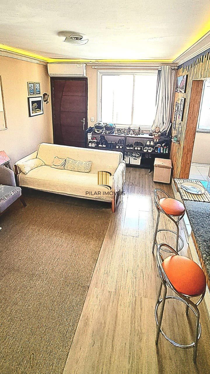 Apartamento de dois quartos e uma vaga de garagem no bairro Menino Deus - Pilar Imóveis