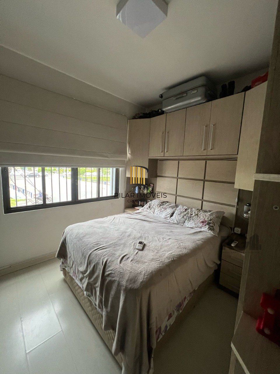 Apartamento de dois quartos no bairro Jardim Botânico em Porto Alegre.