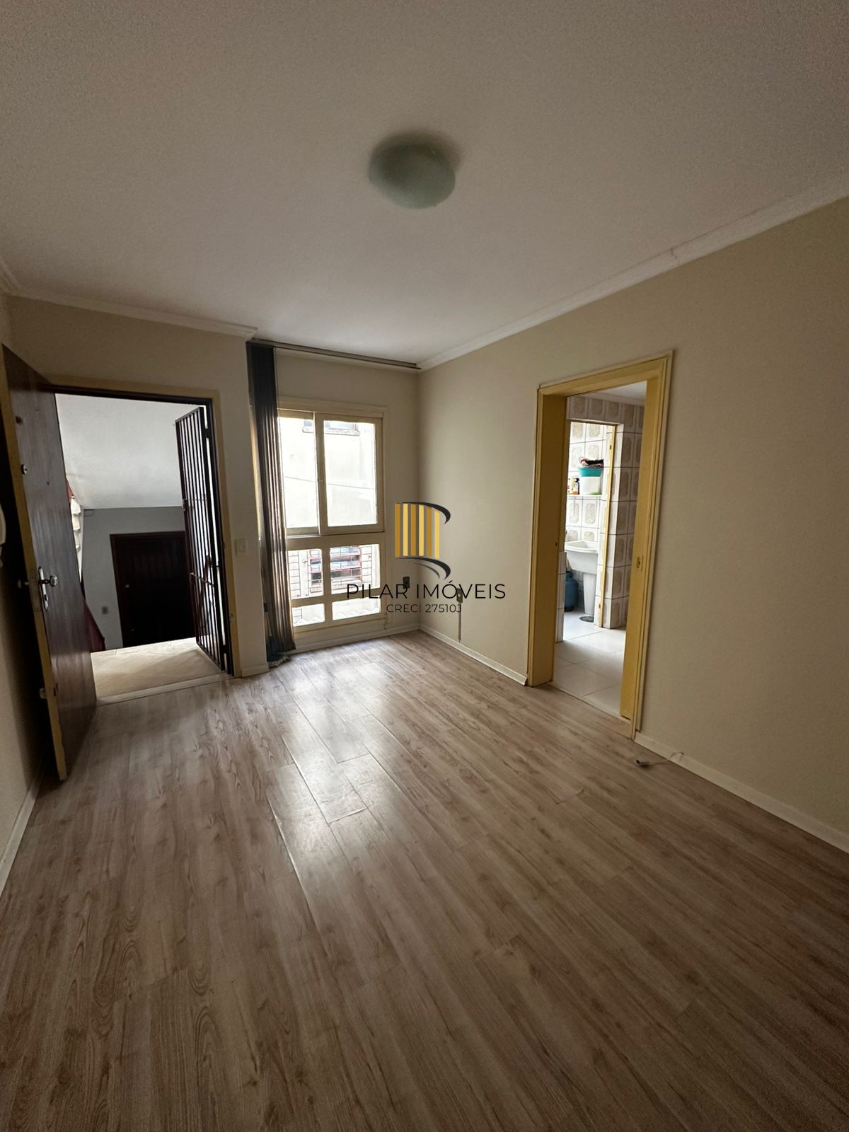 Apartamento de 2 quartos e 1 vaga de garagem no bairro Menino Deus em POA/RS