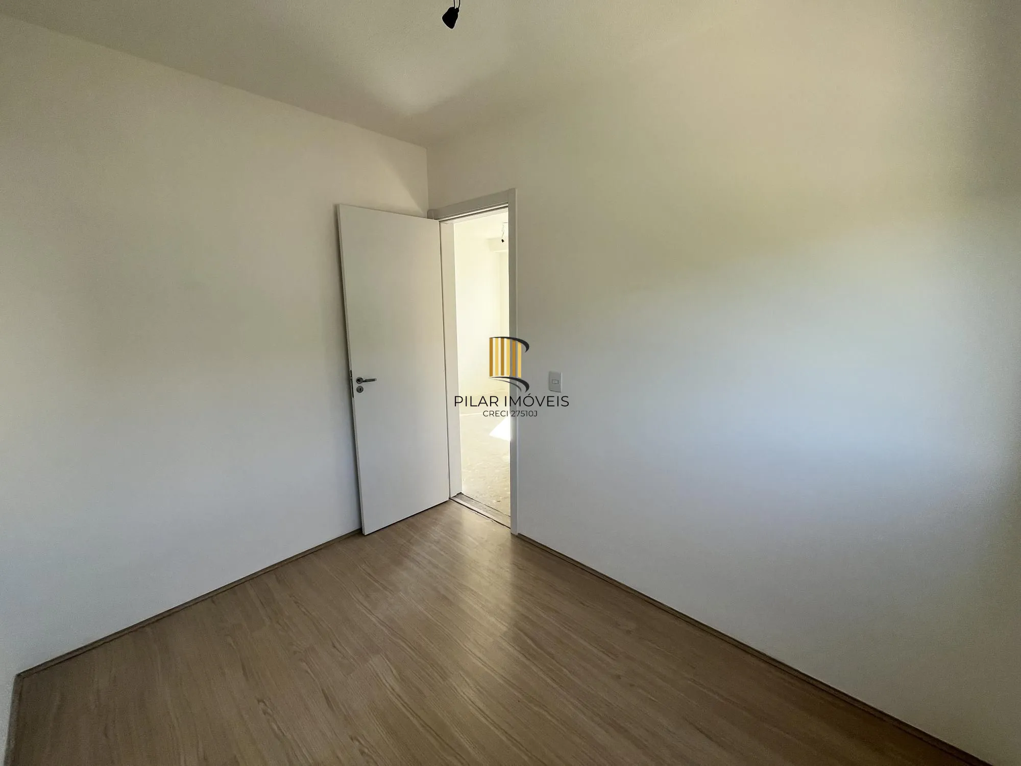 Apartamento de 2 quartos e 1 vaga de garagem no bairro Morro Santana em POA