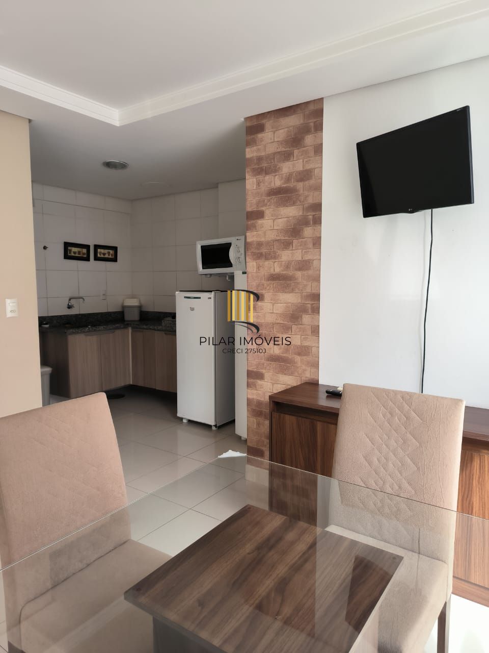 Apartamento de um quarto e uma vaga de garagem no bairro Menino Deus em POA/RS