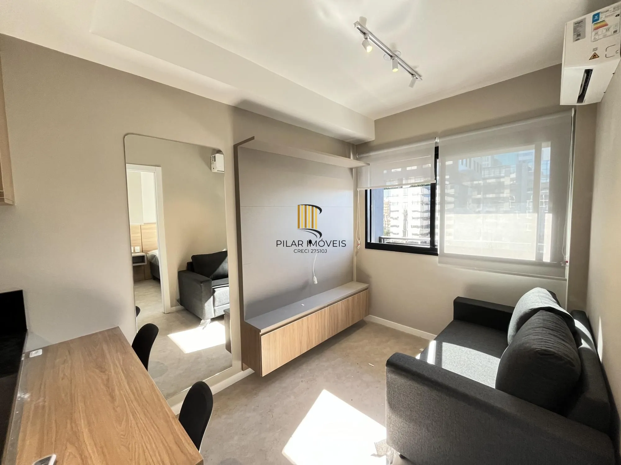 Apartamento semi mobiliado de um quarto com infra e garagem
