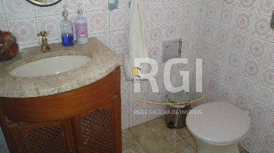 Casa para Venda - 125m², 3 dormitórios, 5 vagas - Menino Deus