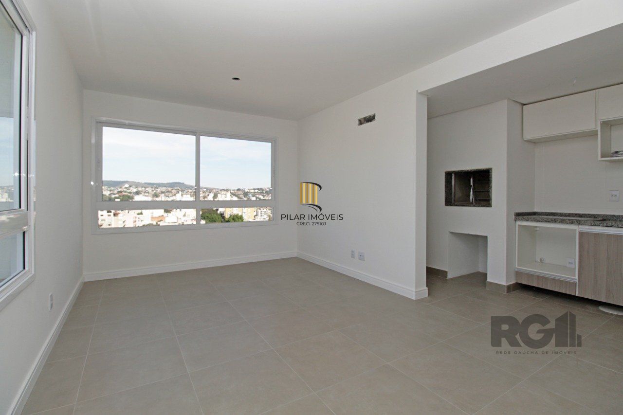 Apartamento de dois dormitórios, suíte e uma vaga de garagem no bairro Petrópolis em Porto Alegre.