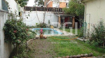 Casa para Venda - 125m², 3 dormitórios, 5 vagas - Menino Deus
