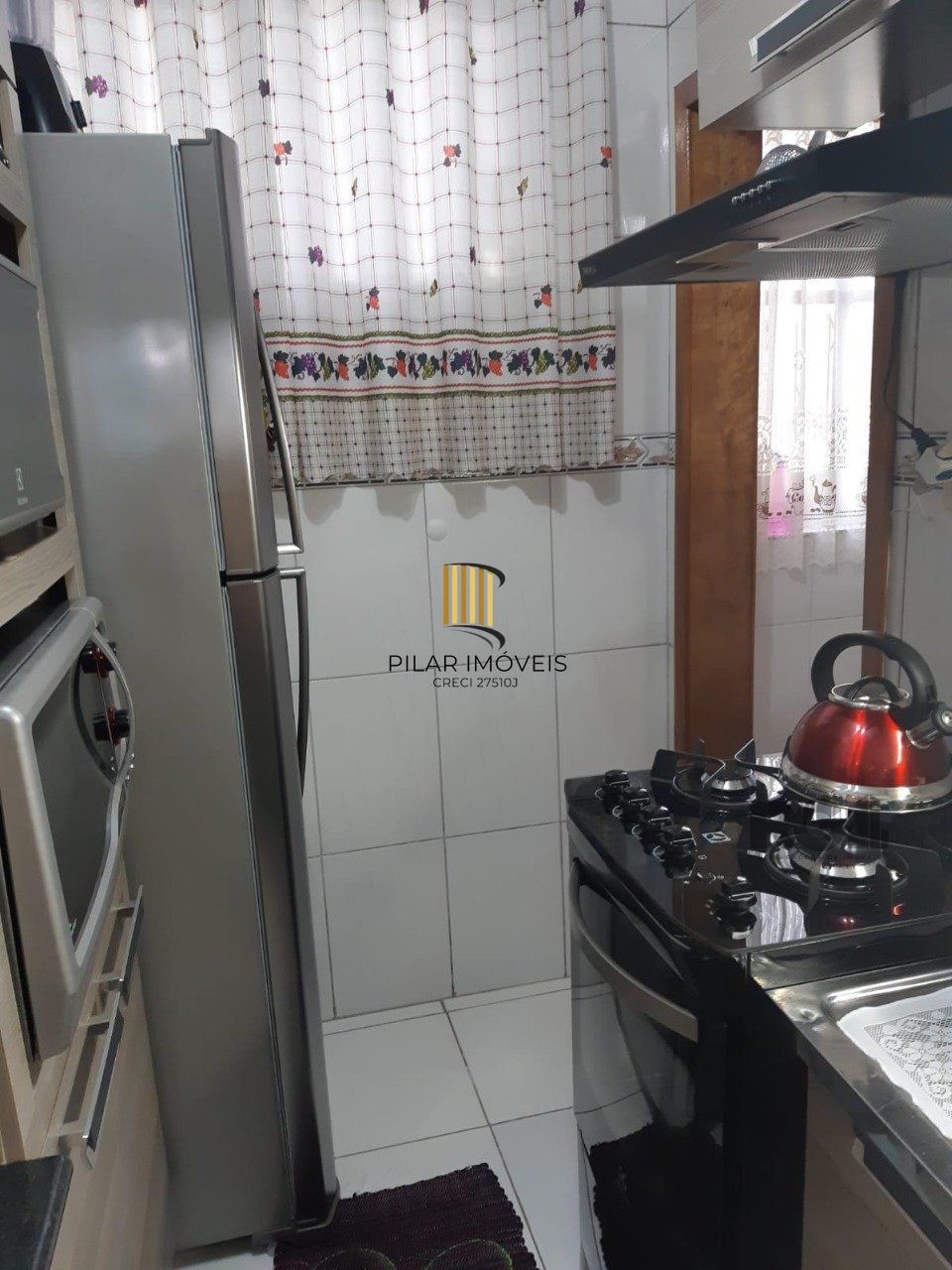   Apartamento térreo de dois dormitórios no bairro Santa Rosa de Lima em Porto Alegre.