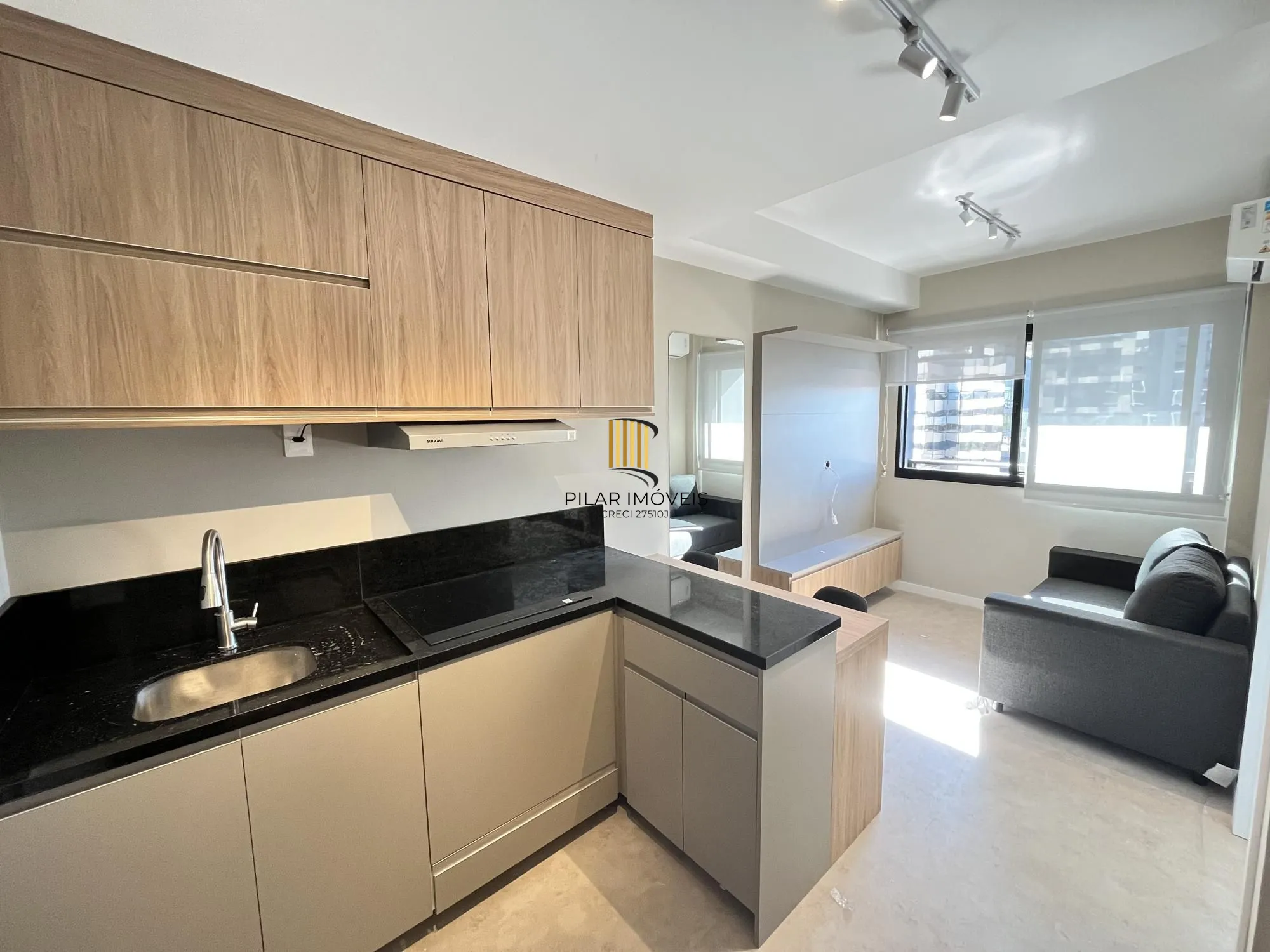 Apartamento semi mobiliado de um quarto com infra e garagem
