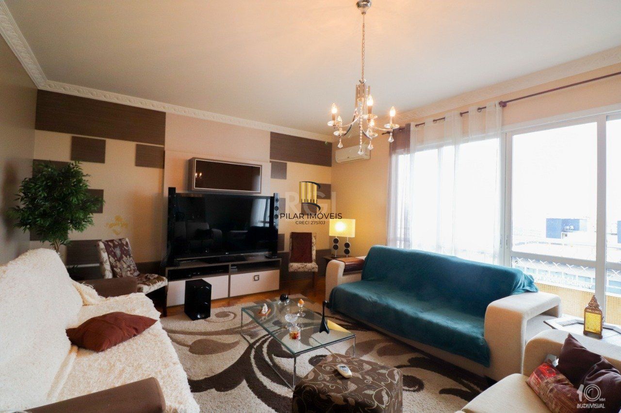 Apartamento á venda com 3 dormitórios com 1 suíte com sacada + 2 sacadas na sala e living, 233,85M²  e 1 vaga de garagem escriturada e coberta, no Bairro Independência em Porto Alegre.