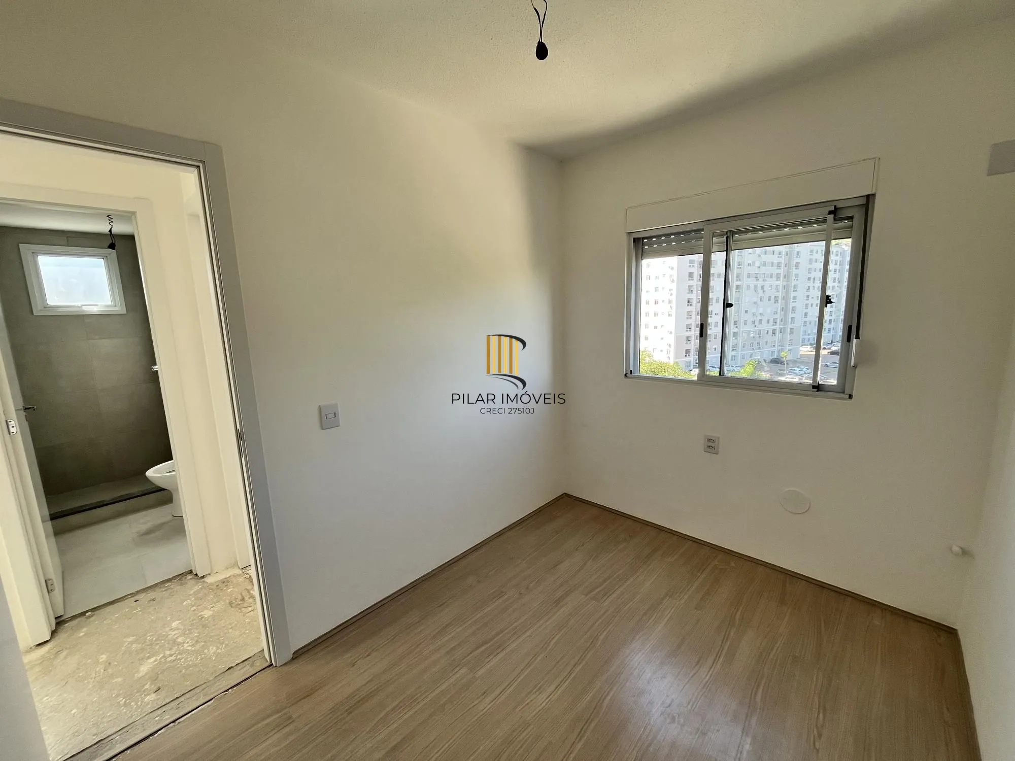 Apartamento de 2 quartos e 1 vaga de garagem no bairro Morro Santana em POA