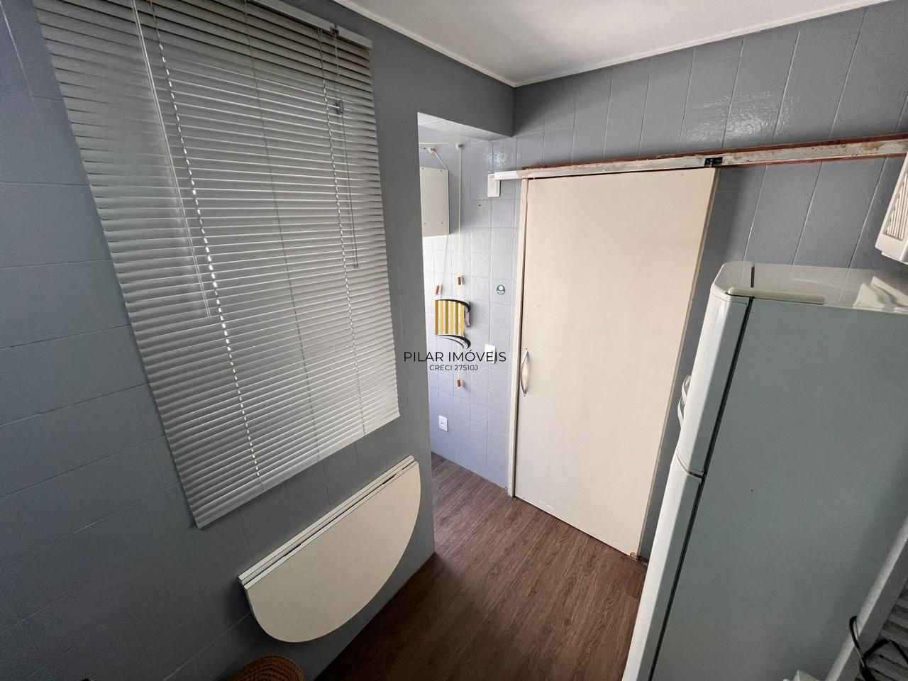 Apartamento de dois quartos e uma vaga de garagem no bairro Petrópolis em POA/RS