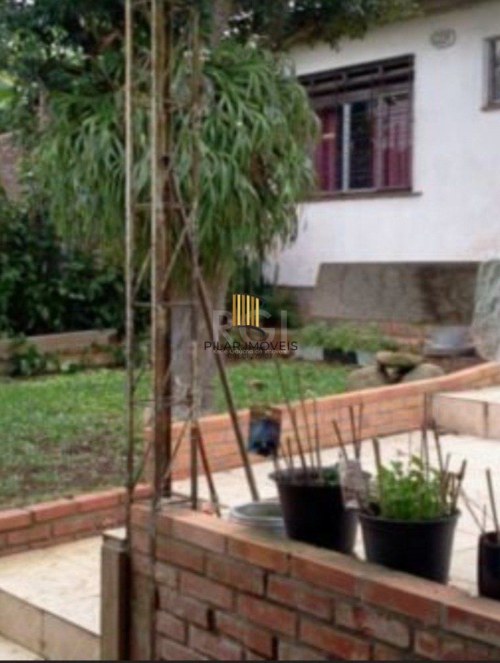 Casa 3 dormitórios no bairro Chácara das Pedras