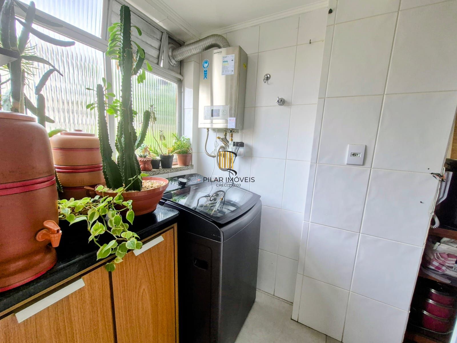 Apartamento de dois dormitórios e uma vaga de garagem no bairro Santana