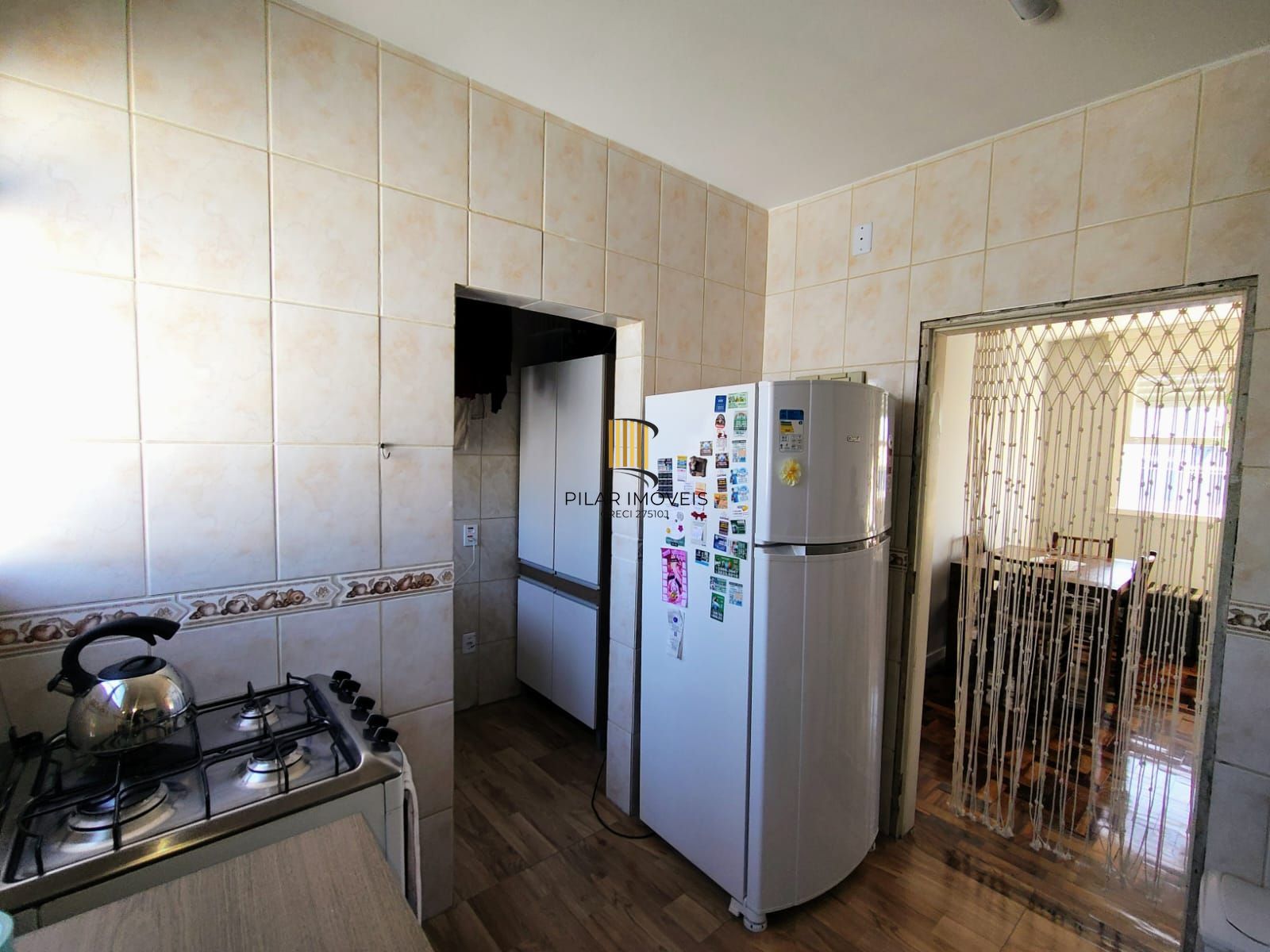 Apartamento de três quartos e uma vaga de garagem rotativa