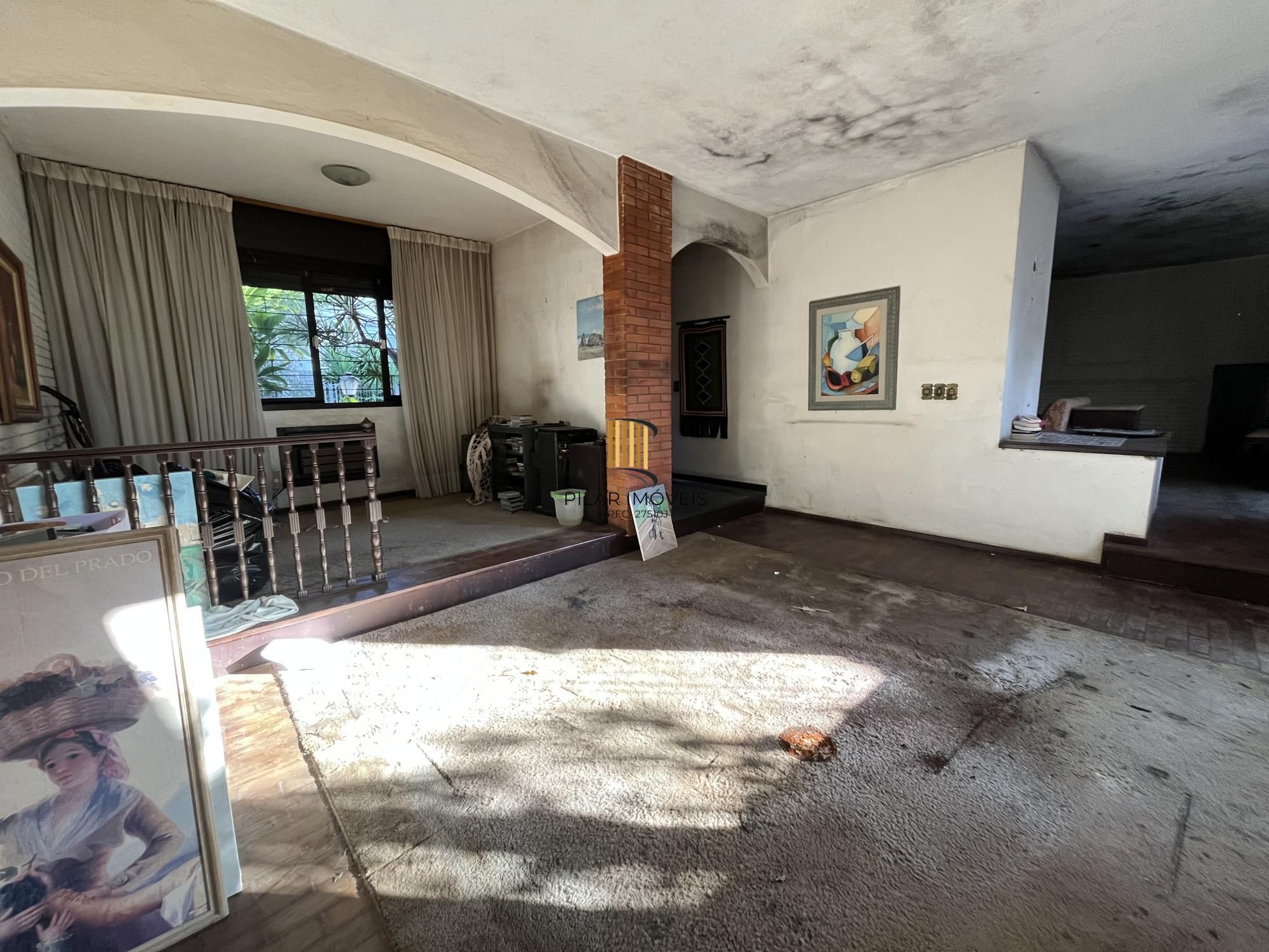 Casa de 3 quartos, suíte e 2 vagas de garagem bairro Auxiliadora em Porto Alegre