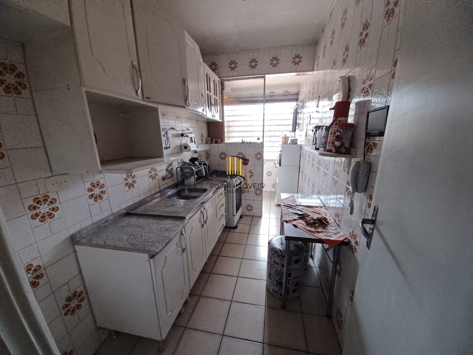 Apartamento de 2 dormitórios lavabo living amplo com sacada  de frente edificio com elevador