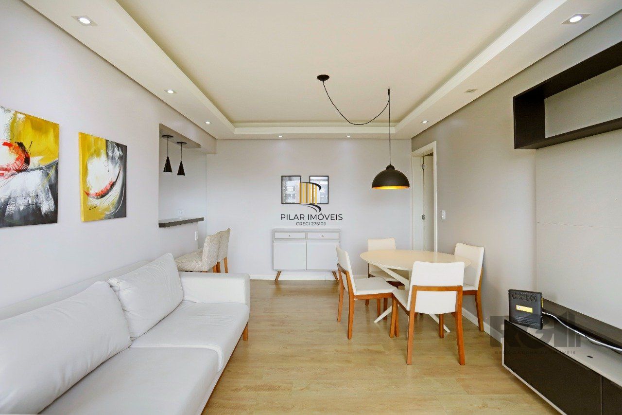Apartamento de 2 quartos, suíte e 2 vagas de garagem no bairro Menino Deus