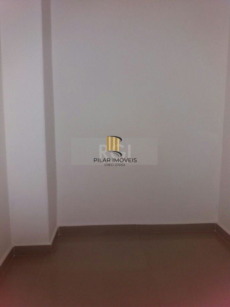 Apartamento de três dormitórios no bairro Independência em Porto Alegre. 