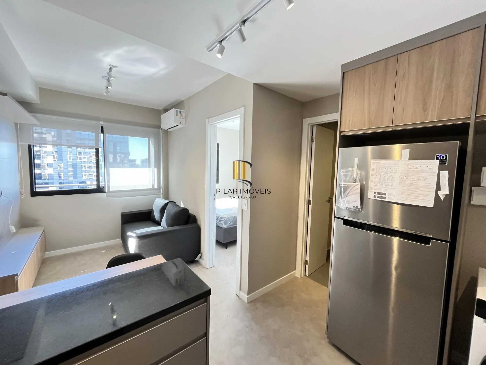 Apartamento semi mobiliado de um quarto com infra e garagem