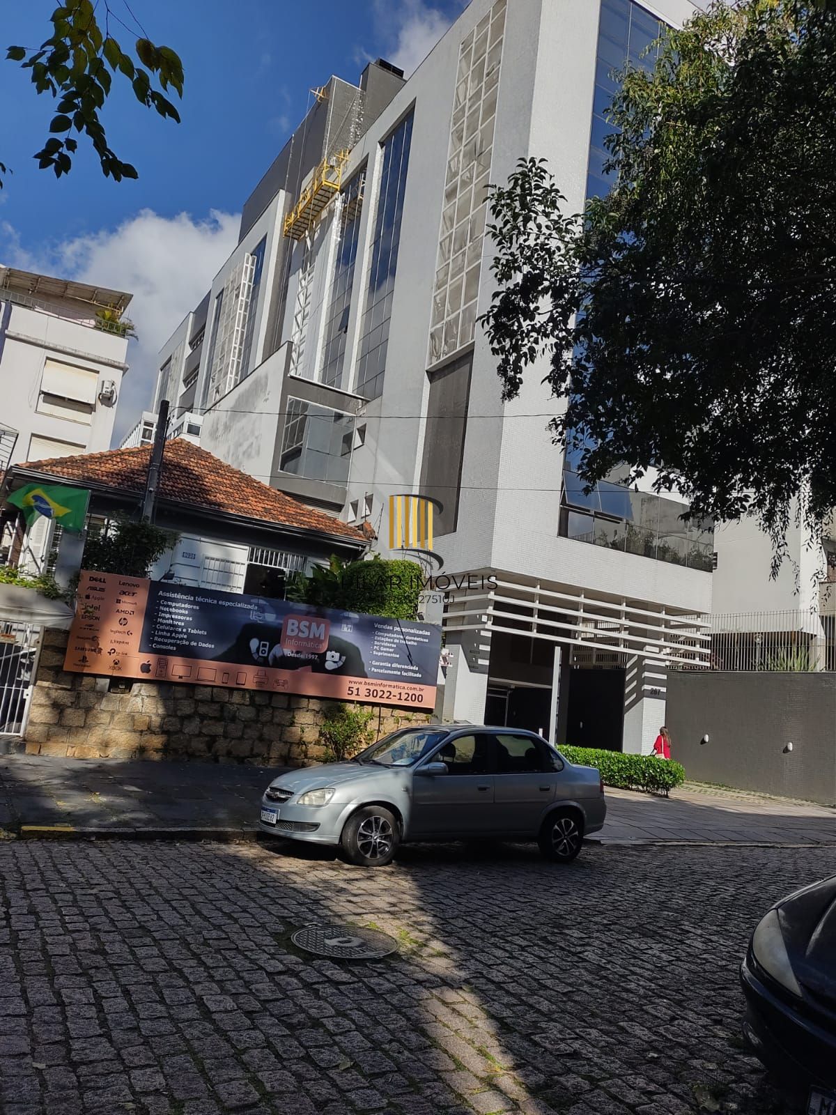 Sala comercial com 2 vagas de garagem escrituradas