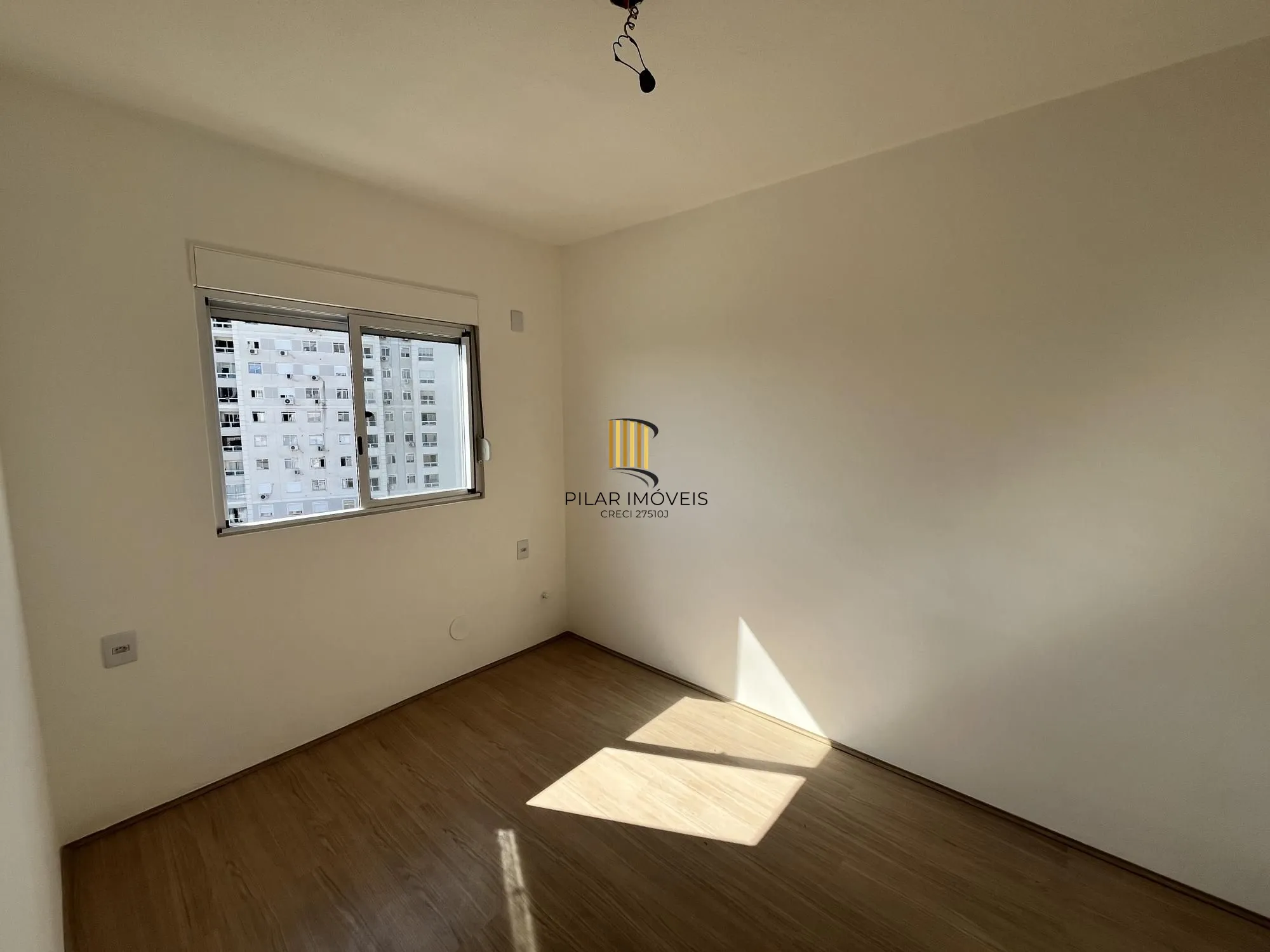 Apartamento de 2 quartos e 1 vaga de garagem no bairro Morro Santana em POA