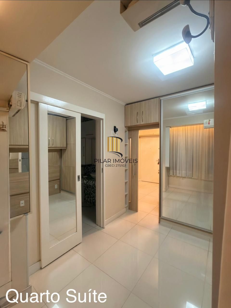 Apartamento de 2 quartos, suíte e 1 vaga de garagem no bairro Menino Deus em POA