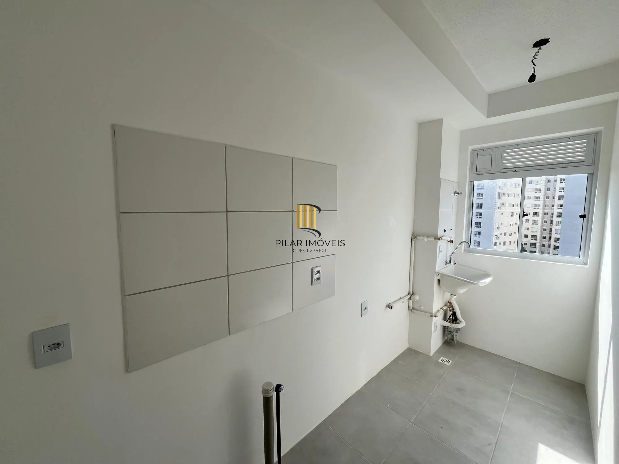 Apartamento de 2 quartos e 1 vaga de garagem no bairro Morro Santana em POA