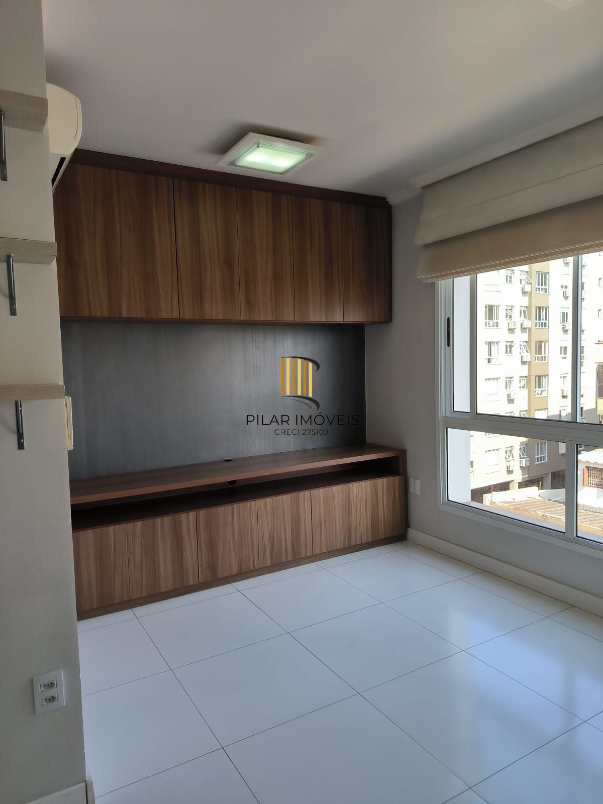 Apartamento de um quarto e uma vaga de garagem no bairro Menino Deus em POA/RS