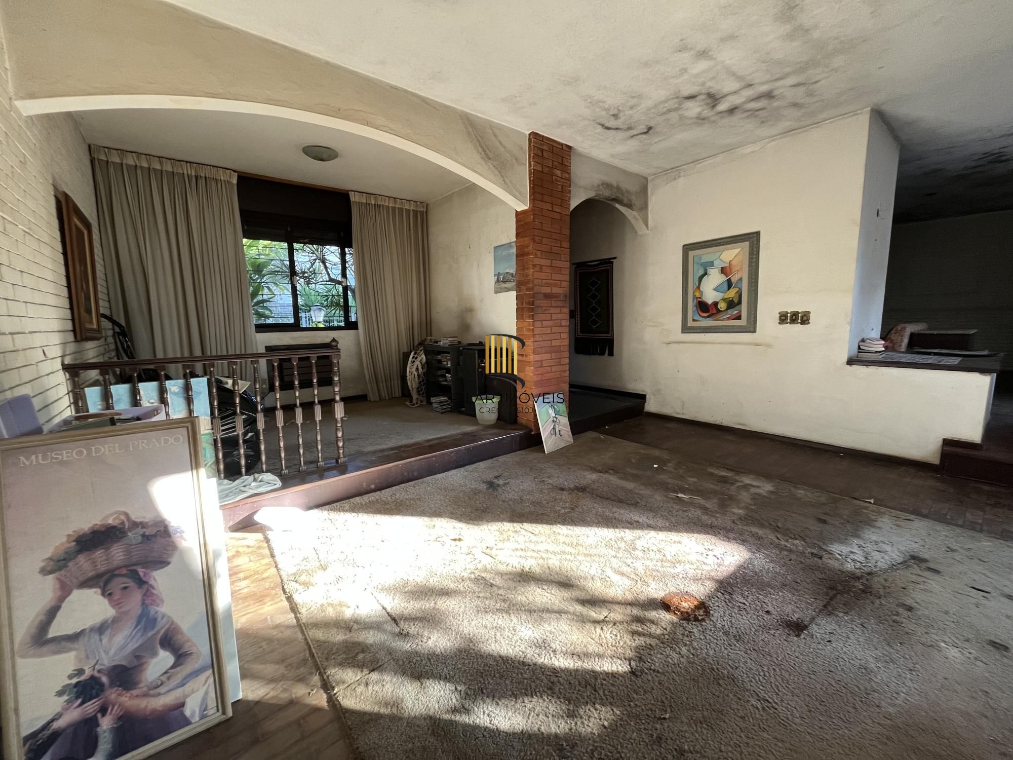 Casa de 3 quartos, suíte e 2 vagas de garagem bairro Auxiliadora em Porto Alegre