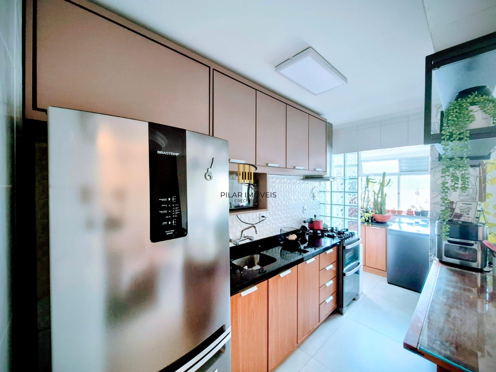 Apartamento de dois dormitórios e uma vaga de garagem no bairro Santana