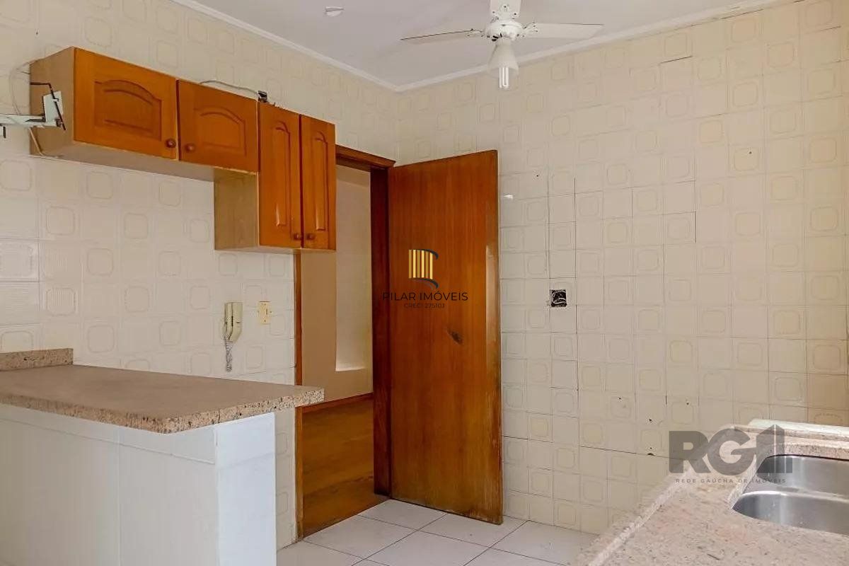  Apartamento amplo com dois dormitórios no bairro Rio Branco  em Porto Alegre.  - Pilar Imóveis