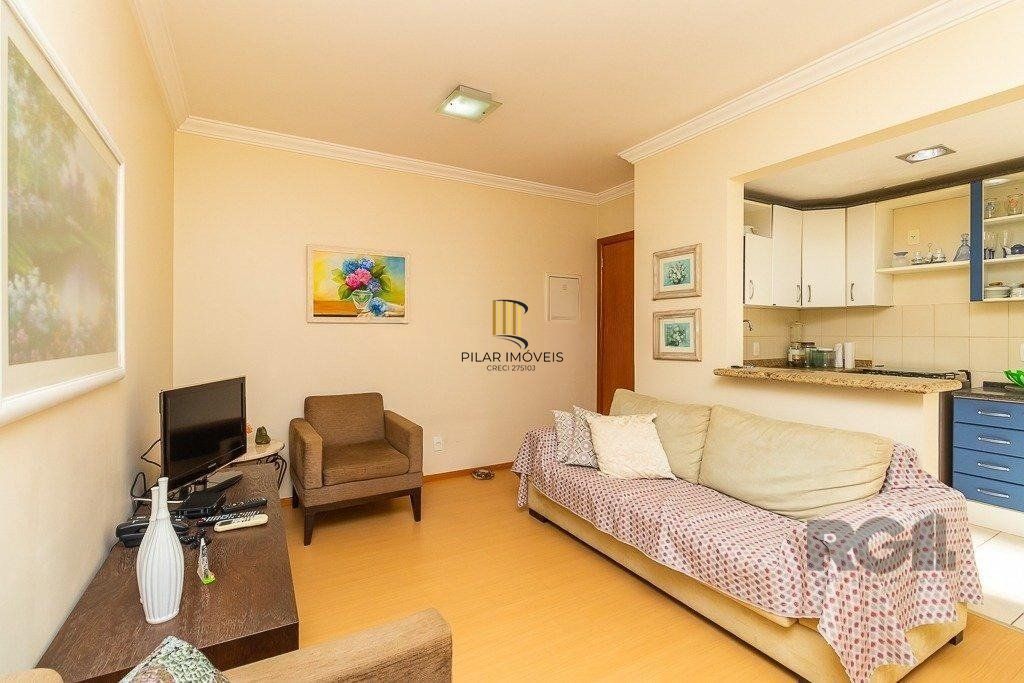   Apartamento de um quarto, suíte e uma vaga de garagem no bairro Menino Deus em Porto Alegre.