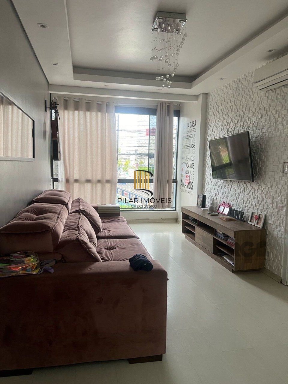 Apartamento de dois quartos no bairro Jardim Botânico em Porto Alegre.