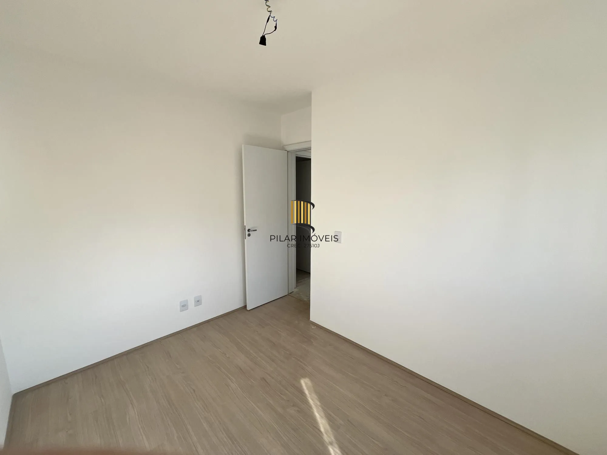 Apartamento de 2 quartos e 1 vaga de garagem no bairro Morro Santana em POA