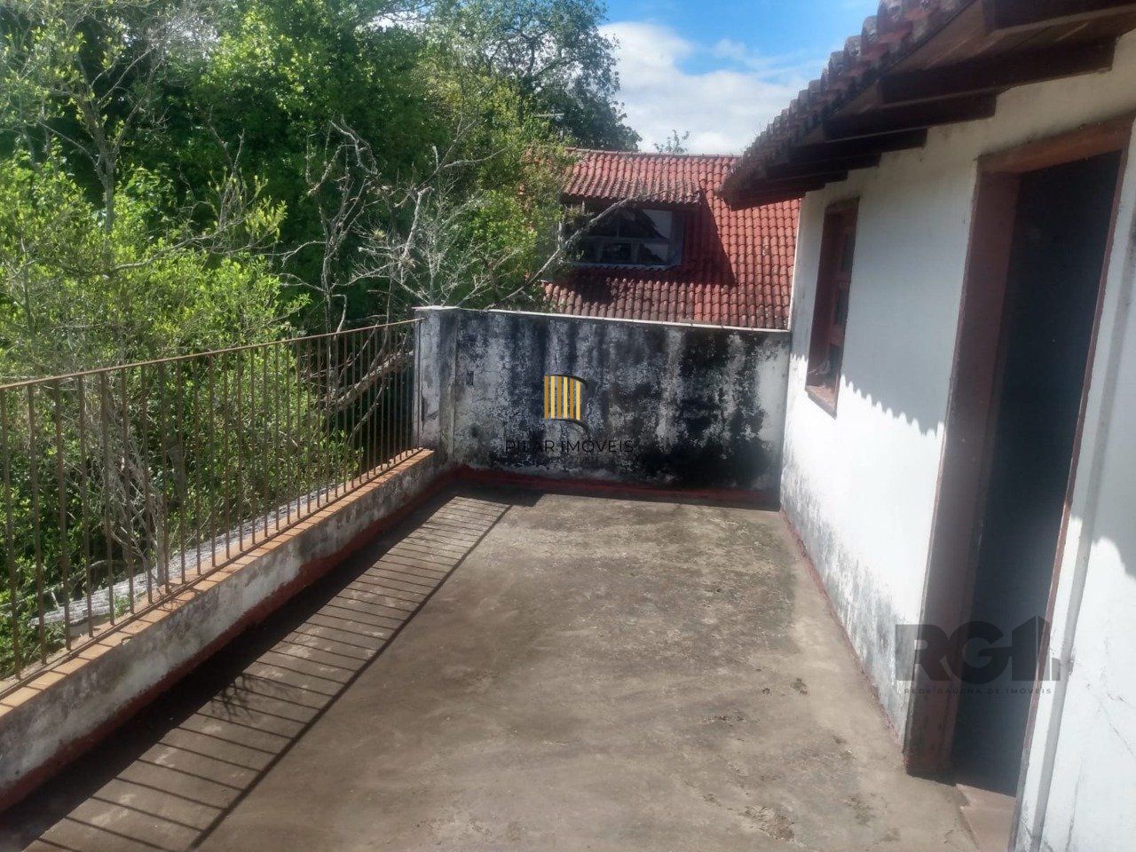 Casa 3 dormitórios no bairro Guarujá
