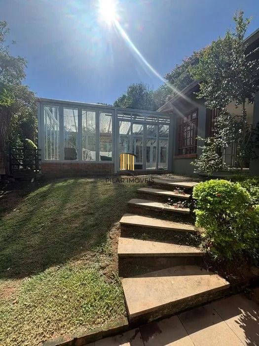 Residência de Luxo em Condomínio Fechado com 4 Dormitórios, 3 Suítes e Área de Lazer Privativa – São Lucas, Viamão/RS