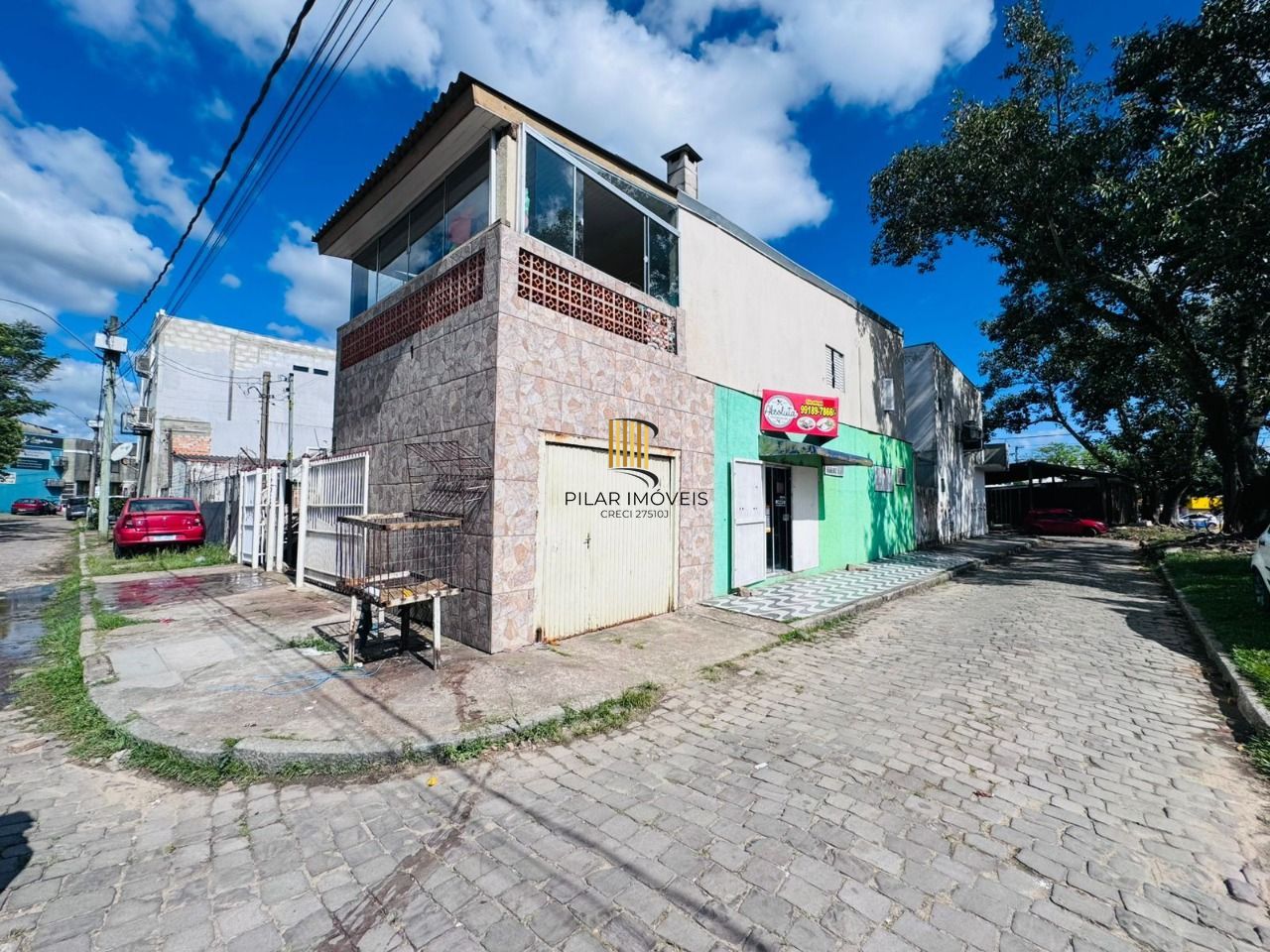 Casa no bairro Restinga - 3 dormitórios
