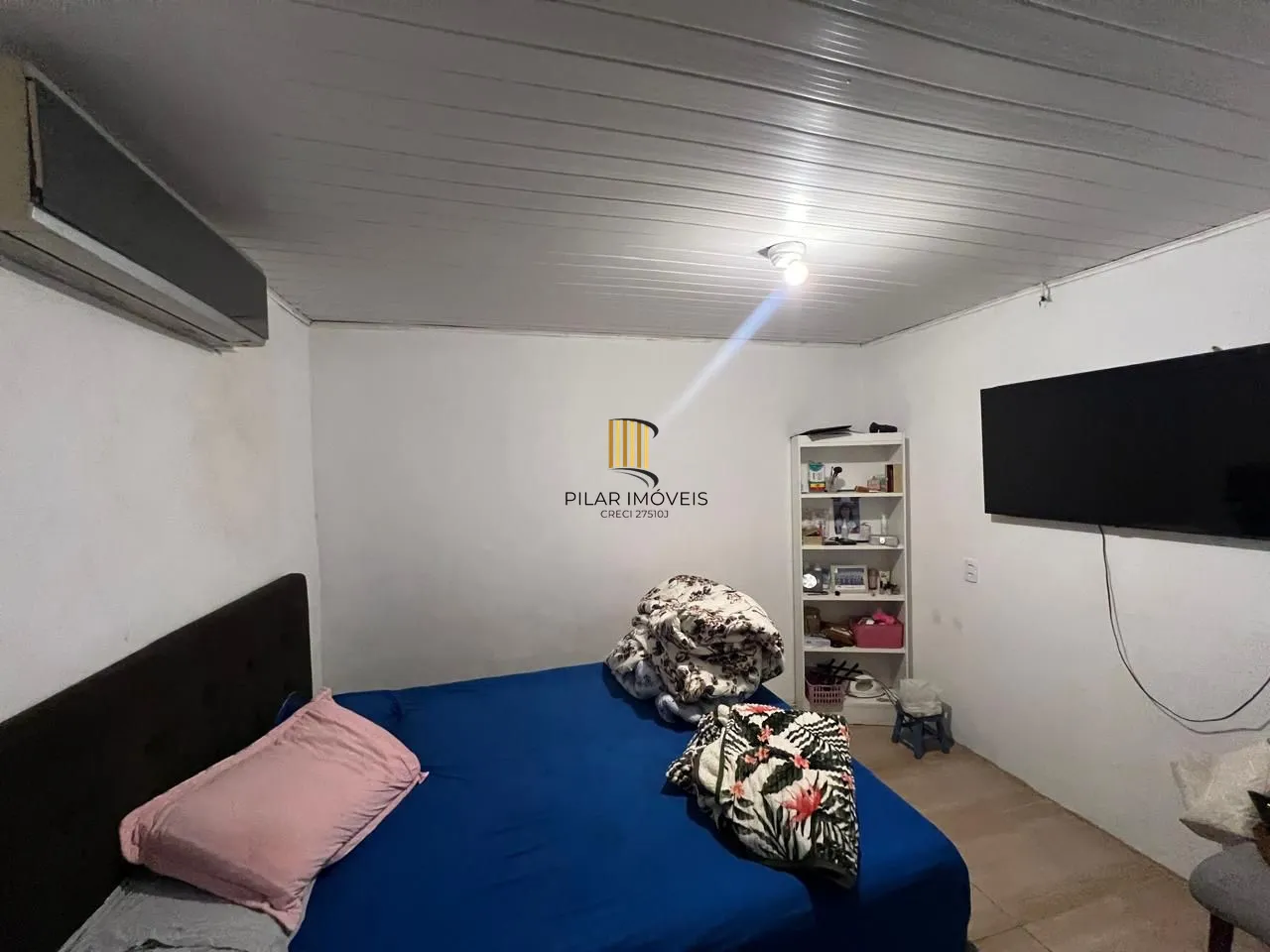 Ótima casa em de 2 dormitórios com piscina  localizada em Viamão