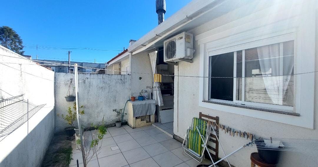 Casa em condomínio no bairro Hípica - 2 dormitórios - 1 Vaga