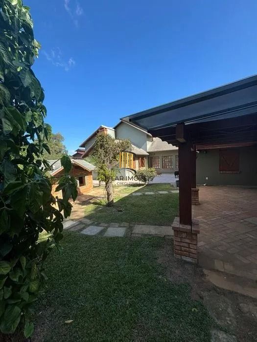 Residência de Luxo em Condomínio Fechado com 4 Dormitórios, 3 Suítes e Área de Lazer Privativa – São Lucas, Viamão/RS