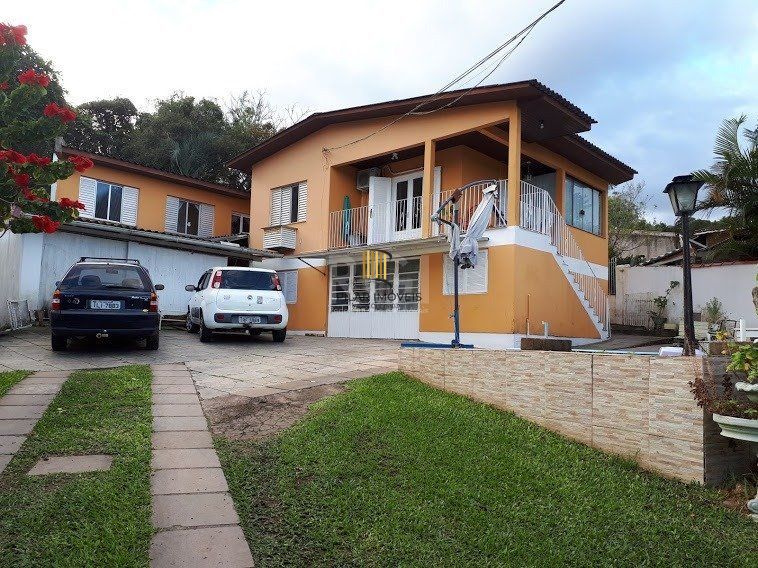 Casa com 4 dormitórios no bairro Vila Nova - Pilar Imóveis