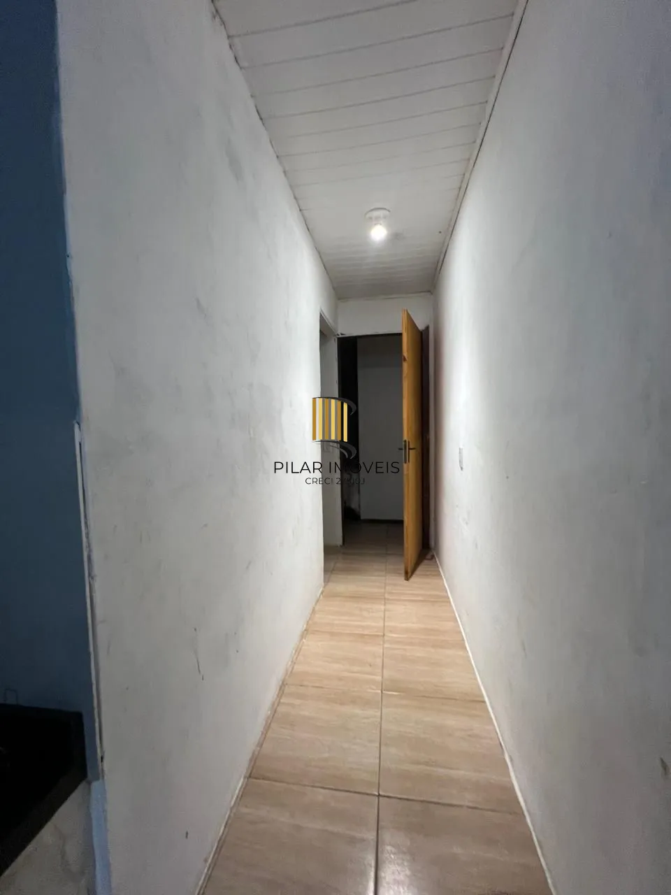 Ótima casa em de 2 dormitórios com piscina  localizada em Viamão