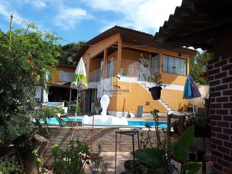 Casa com 4 dormitórios no bairro Vila Nova